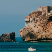 Cliff and Lighthouse in Nazaré - Portugal